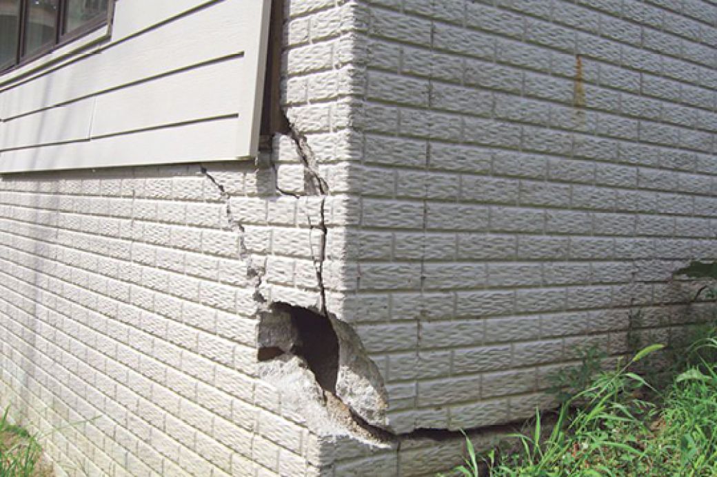 Large foundation crack on the corner of a house