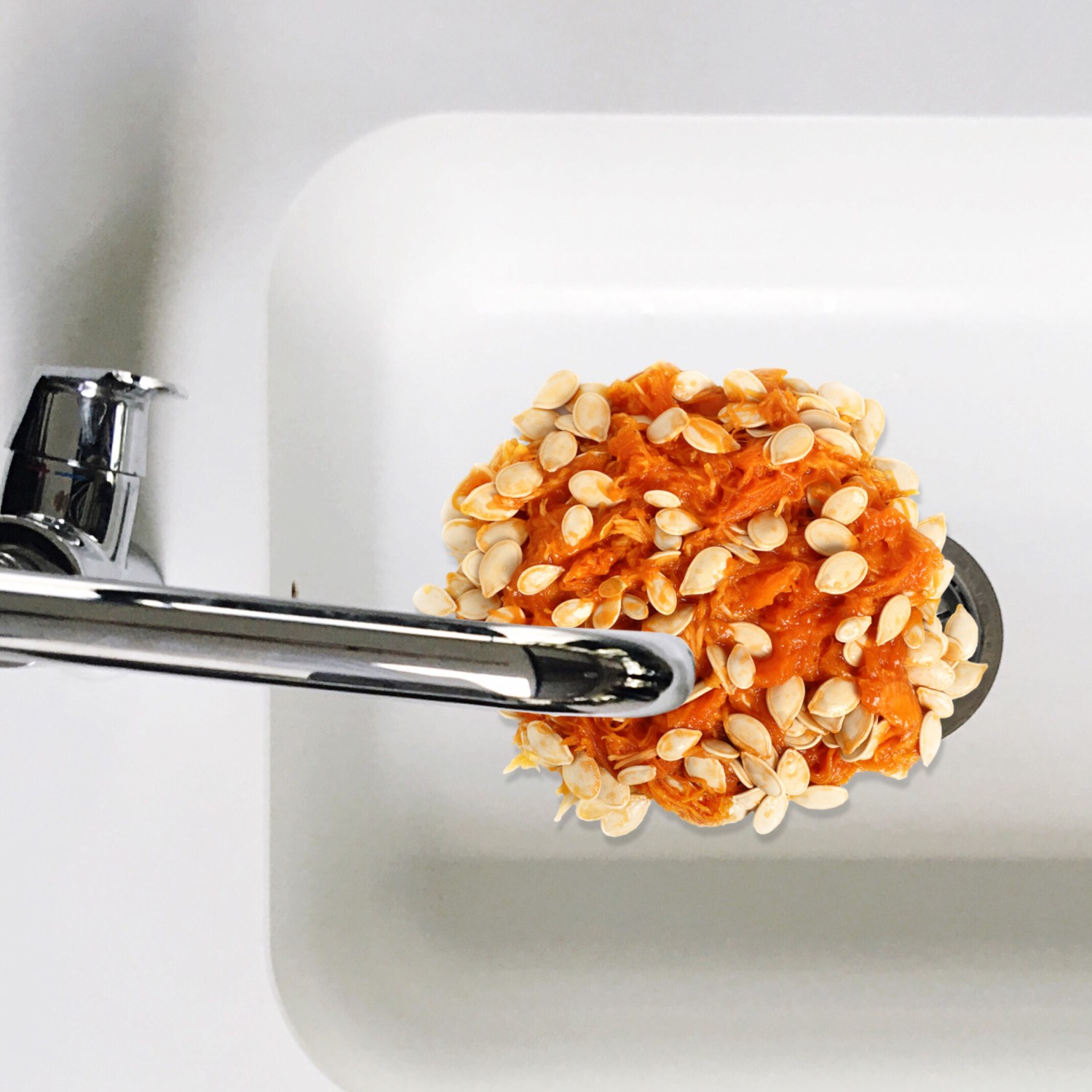 Pumpkin pulp in a kitchen sink