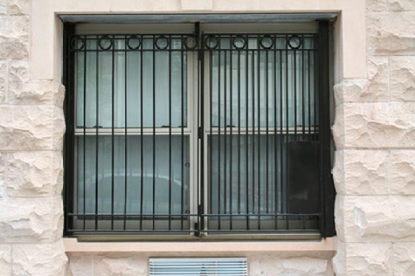 Decorative burglar bars on a window