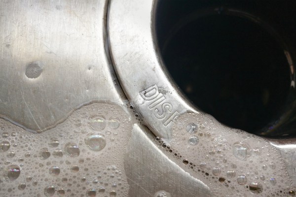 Closeup of a garbage disposal in a kitchen sink