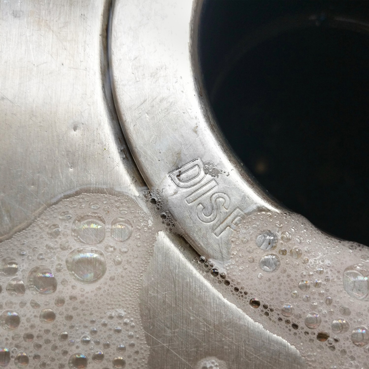 Closeup of a garbage disposal in a kitchen sink