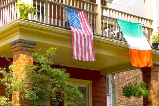 A home with the U.S. and Italian flags displayed