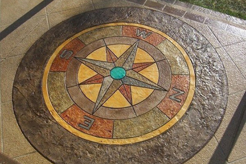 Stamped concrete patio compass