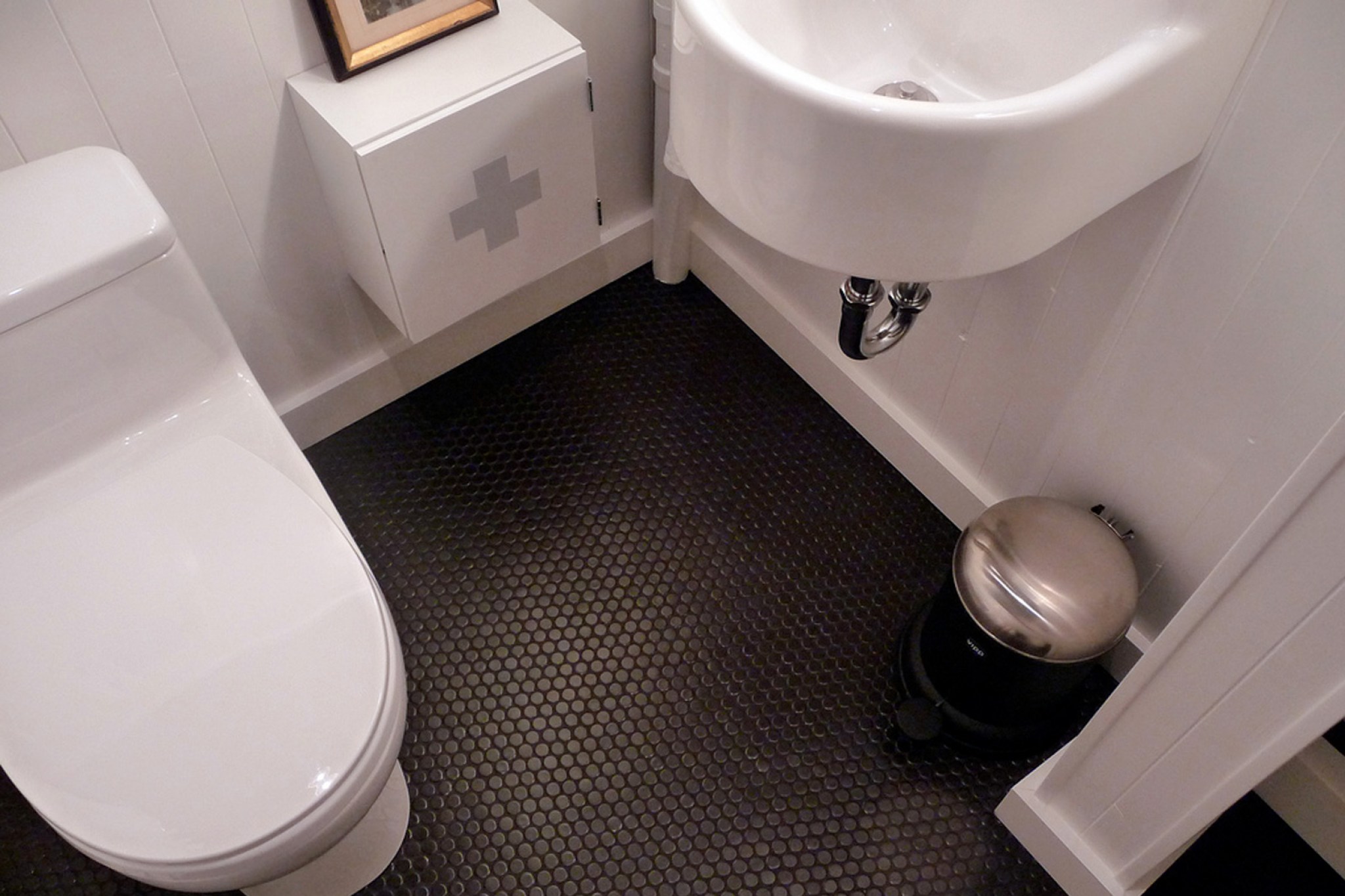 Anna's hip black penny tile bathroom floor