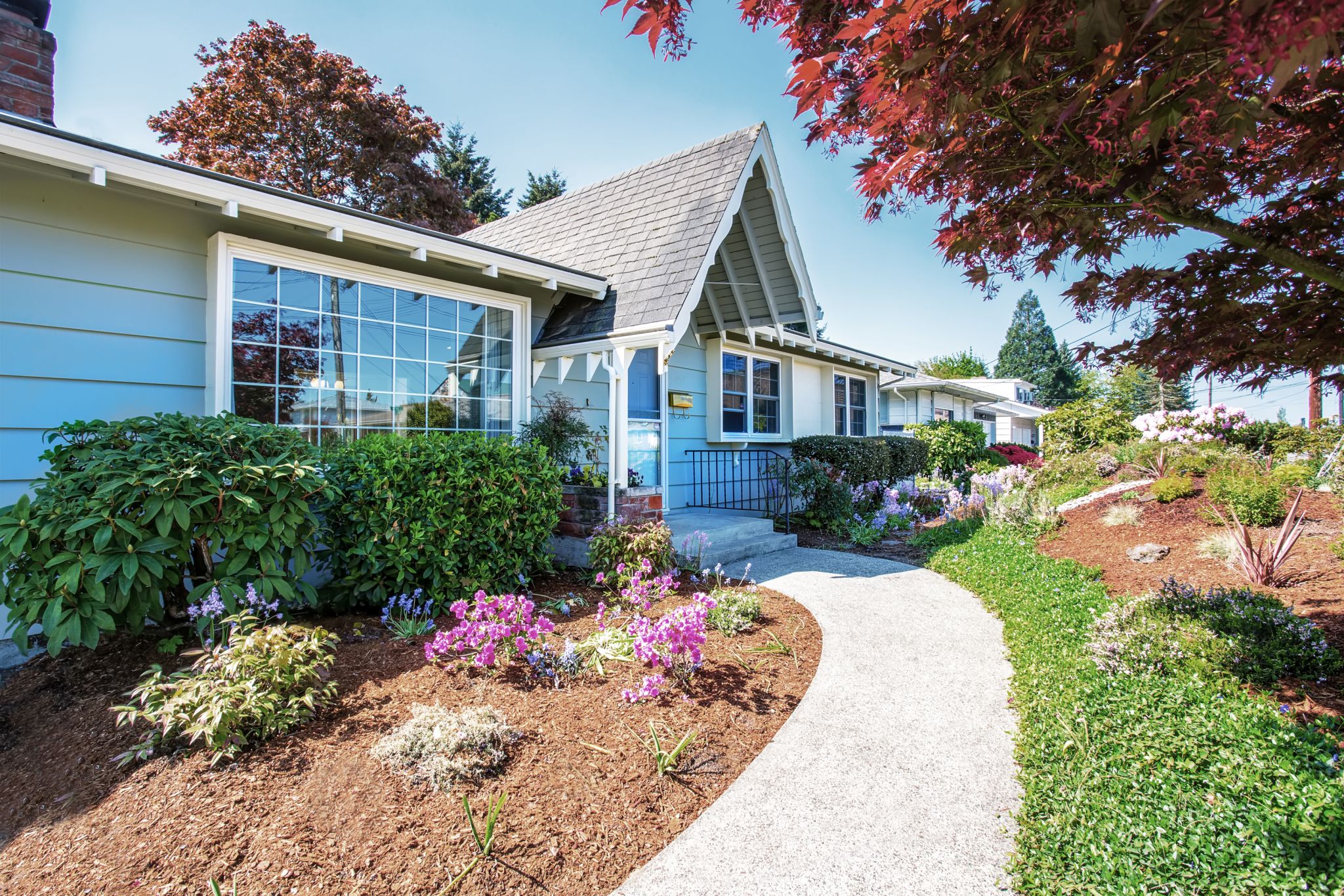 Home with lovely plantings for curb appeal