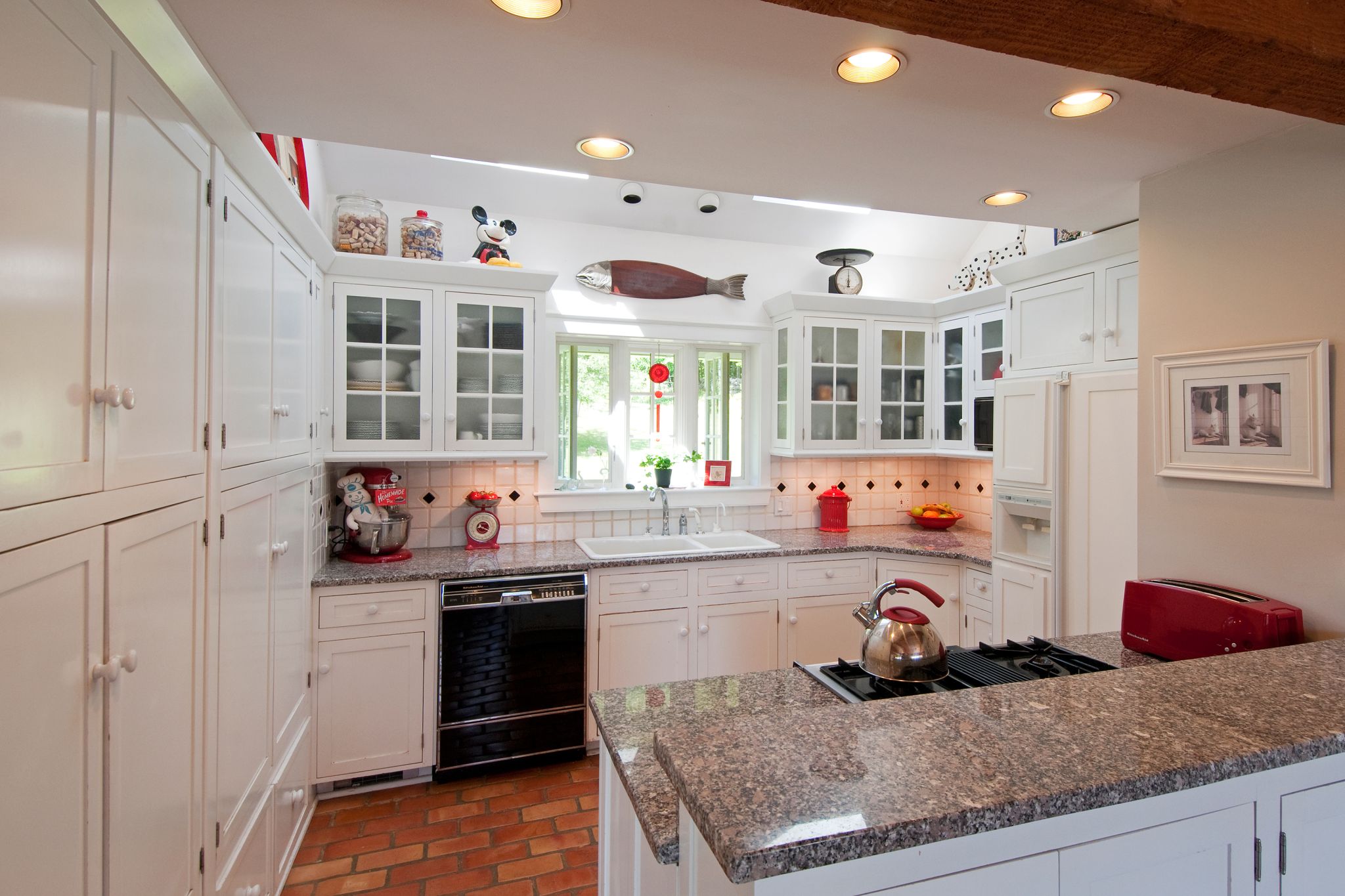 Kitchen with several kinds of lighting