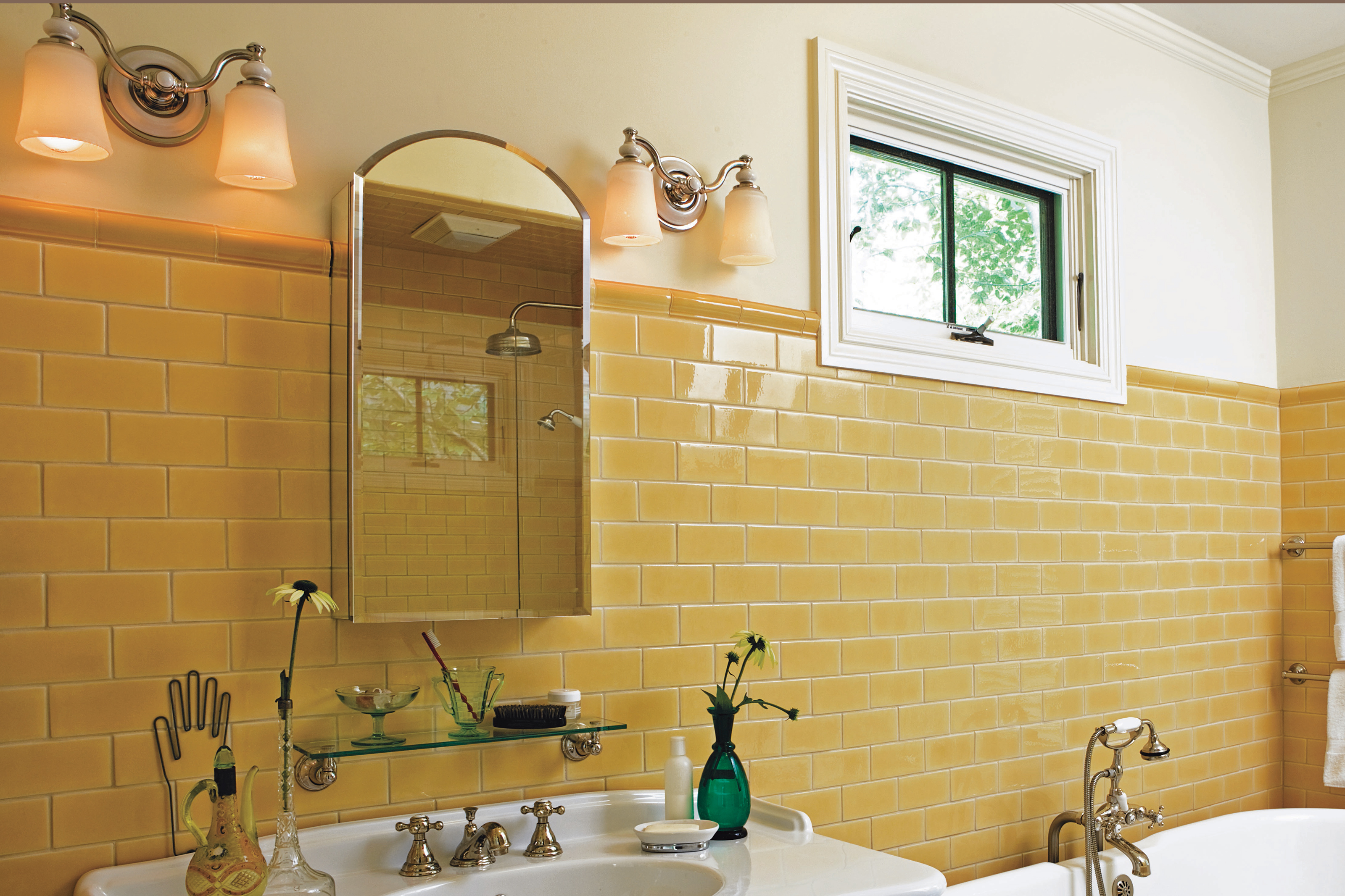 gold and crystal over the bathroom sink