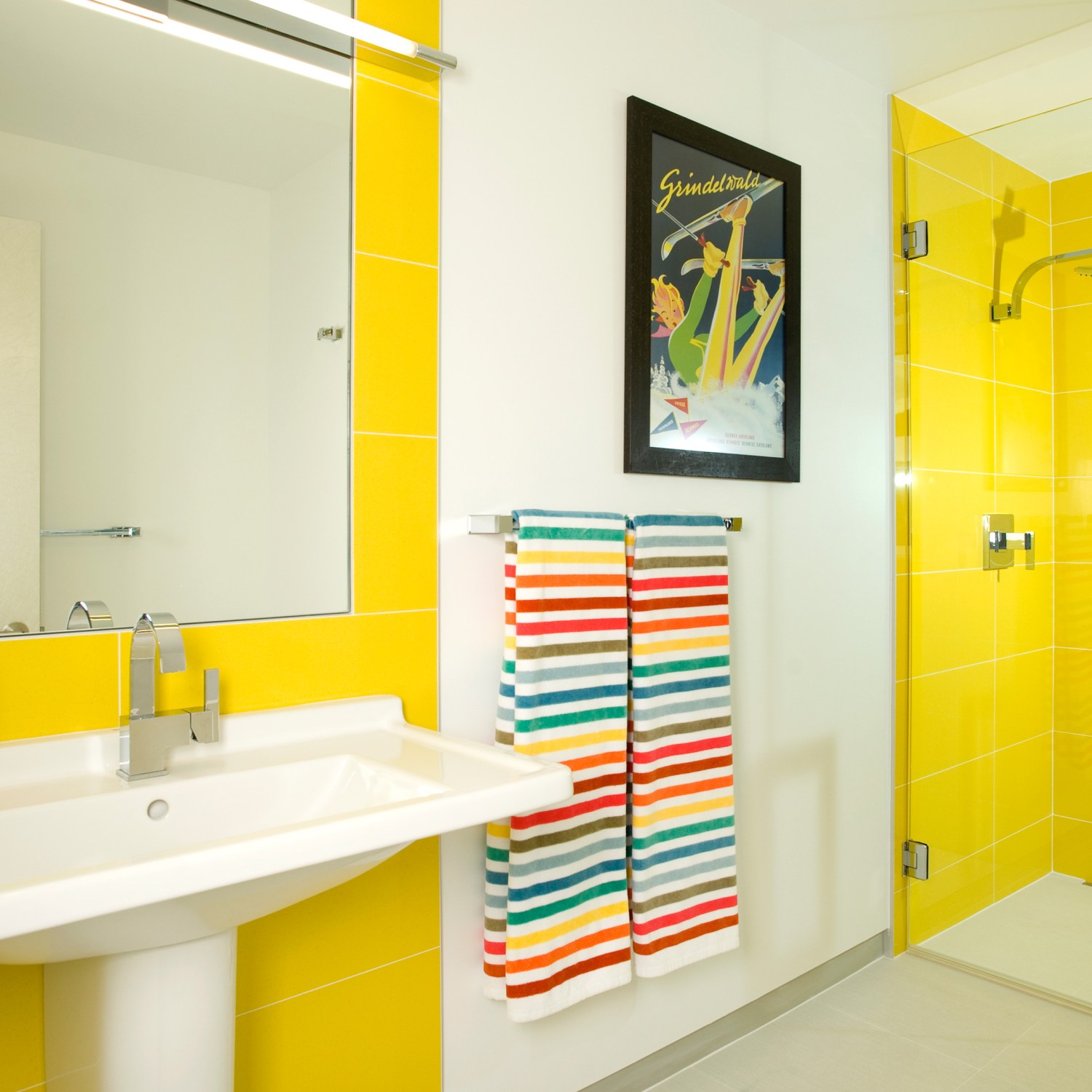 Yellow bathroom with walk-in shower