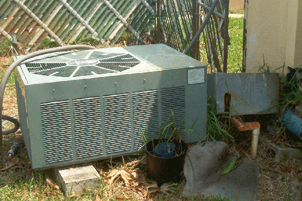 AC Unit Missing a Concrete Slab | Building Code Violations