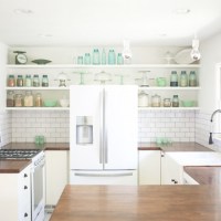 A kitchen with white appliances