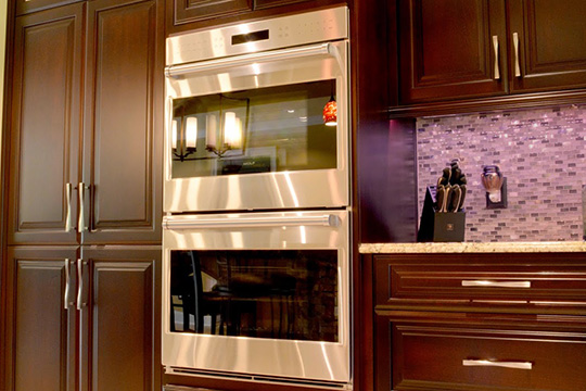 Double wall ovens in a newly renovated home kitchen