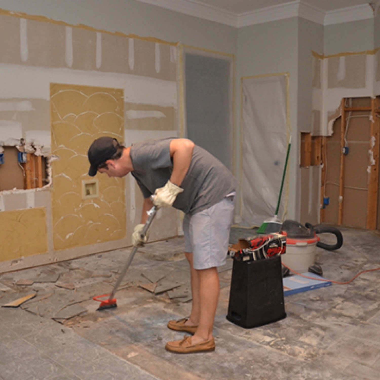 Removing kitchen floor during a house remodel