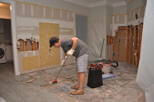 Removing kitchen floor during a house remodel