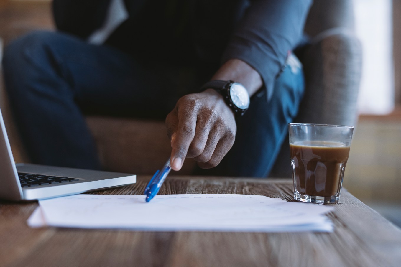 Man checking over real estate closing papers