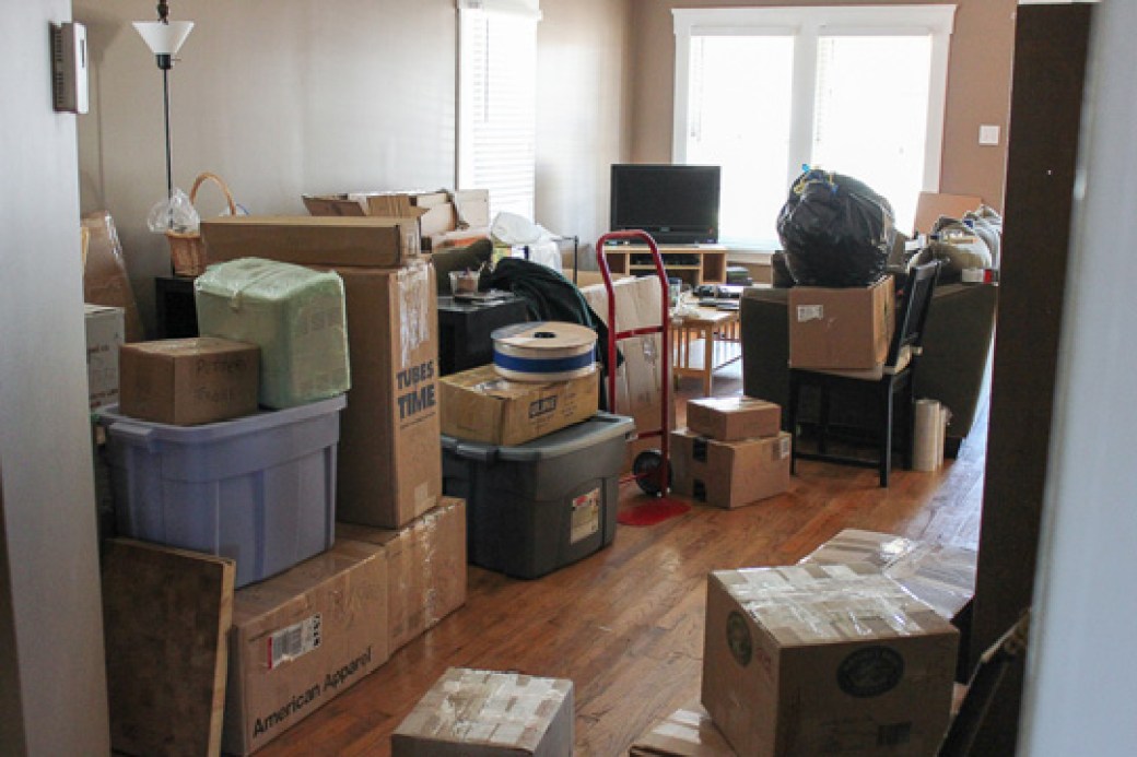 Packed moving boxes in a home