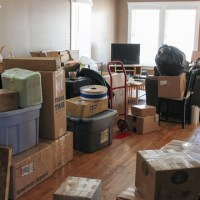 Packed moving boxes in a home