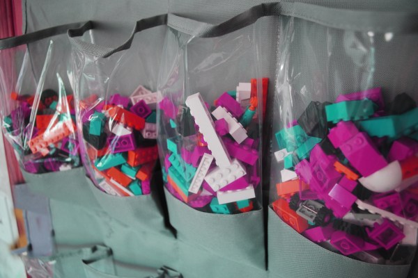 Legos stored in a shoe organizer