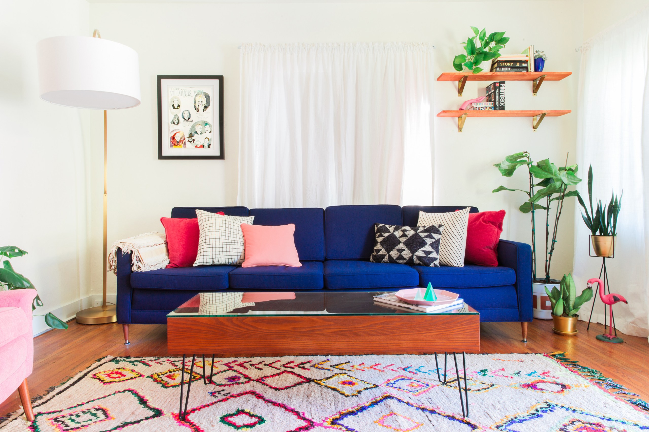 Stunning blue couch in home staged for sale