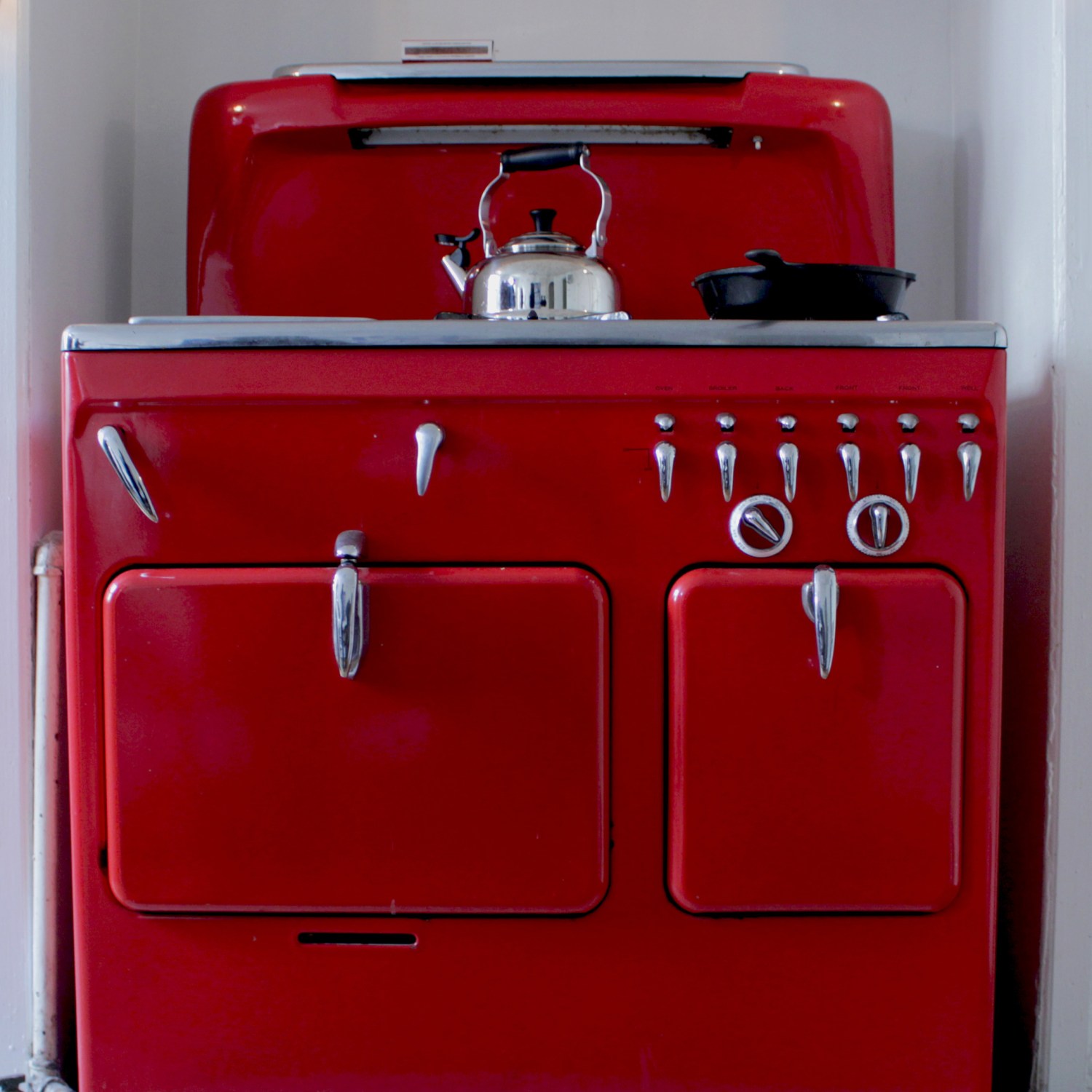 Red vintage stove in a home kitchen