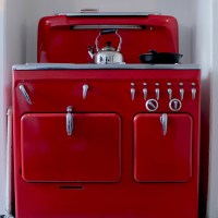 Red vintage stove in a home kitchen