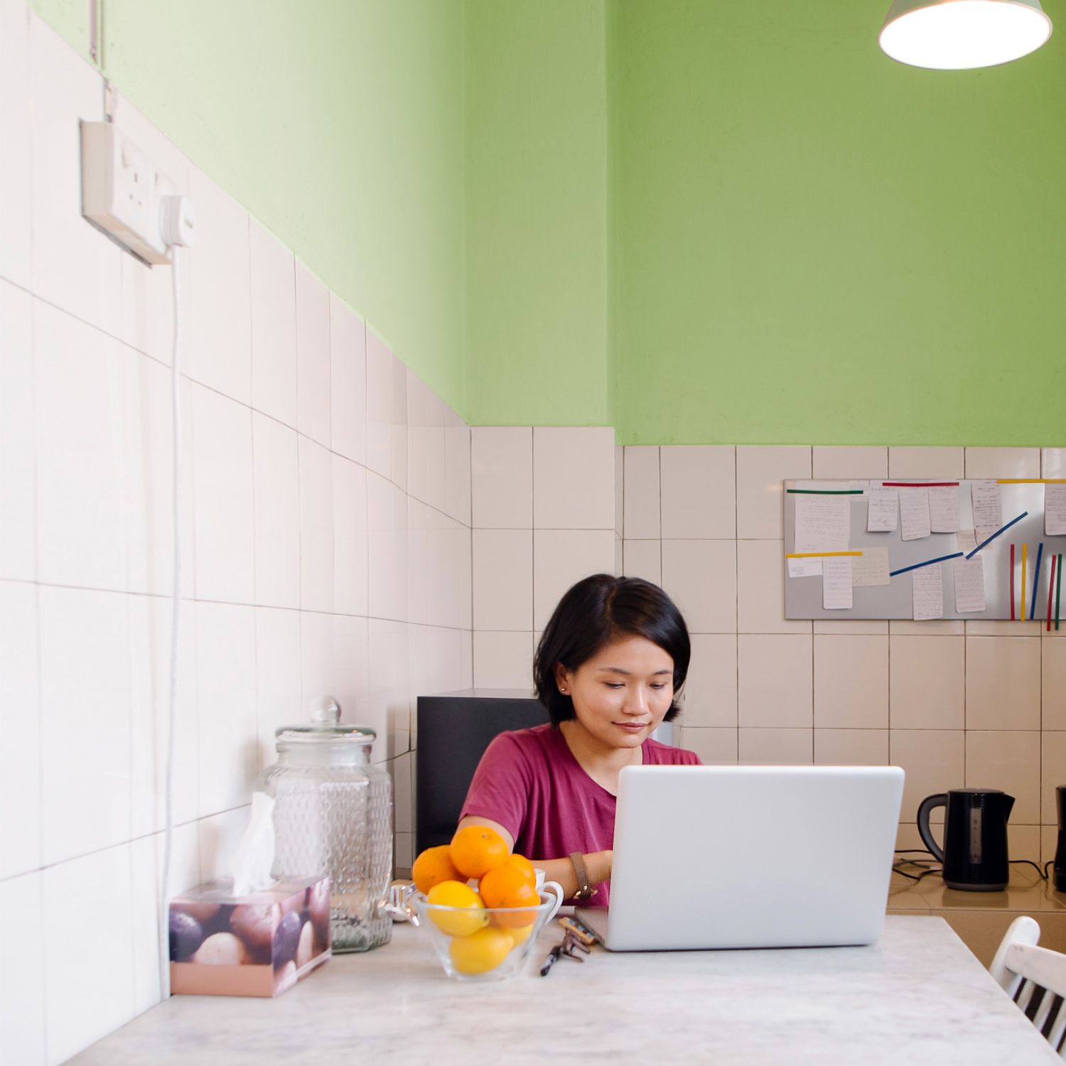 Penny-pinching woman in her kitchen