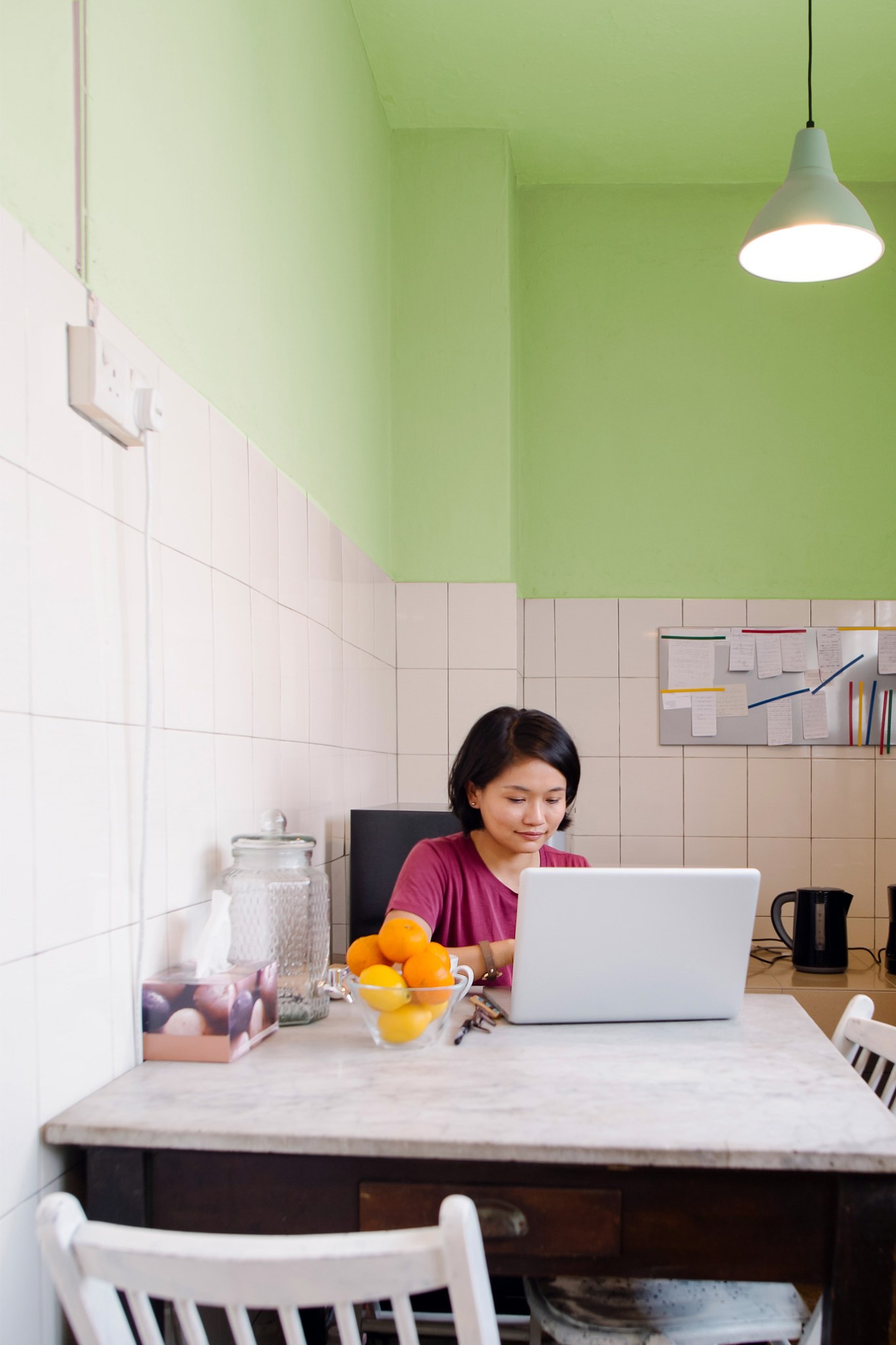 Penny-pinching woman in her kitchen