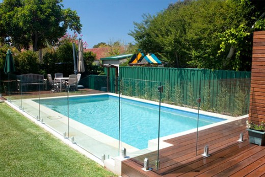 Glass fence around a home pool