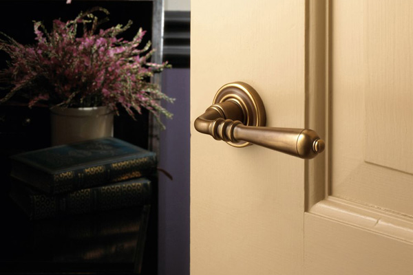 An interior door in a house with a lever handle