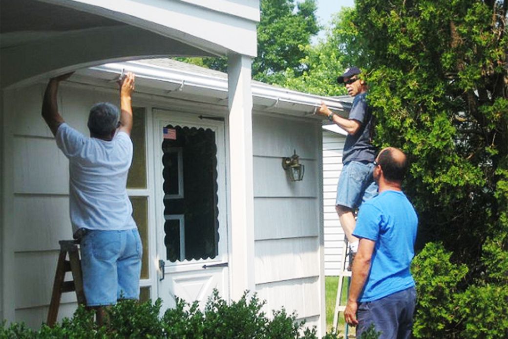 Replacing Rain Gutters Home Downspout Replacement