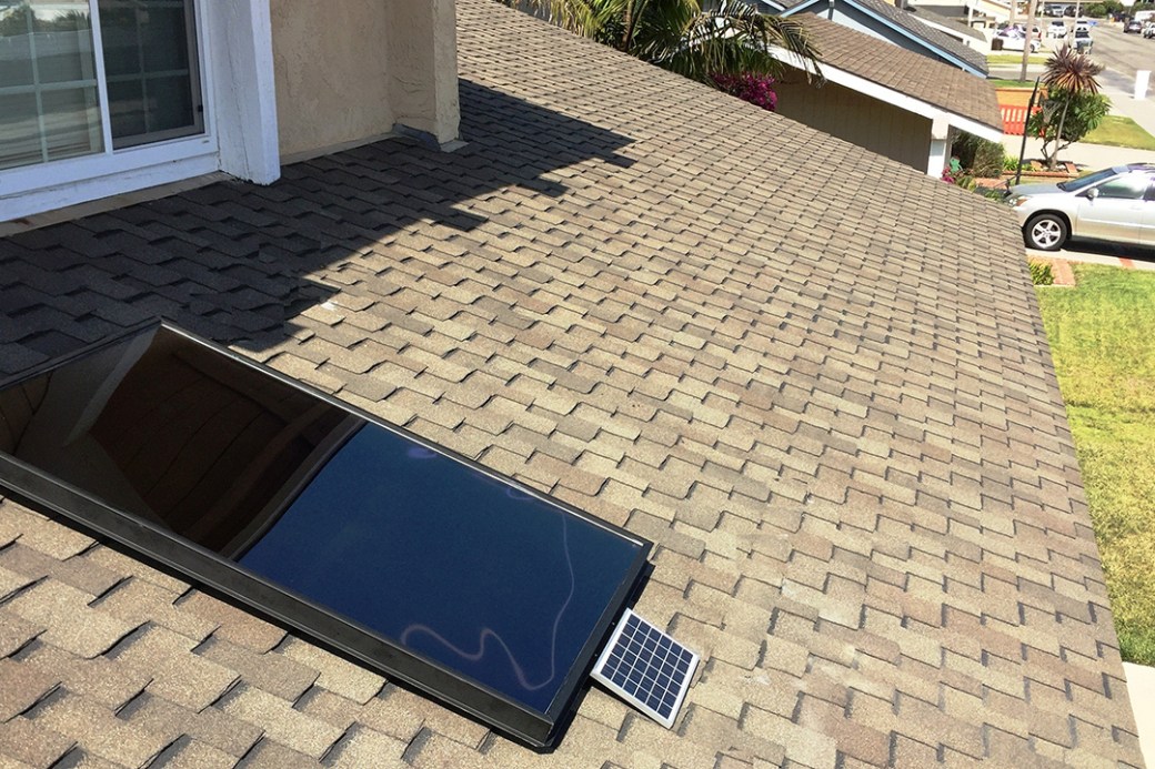 Solar air heater installed on roof of suburban home