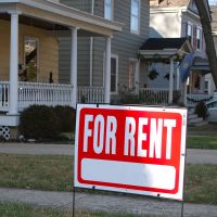 A for rent sign outside of a house