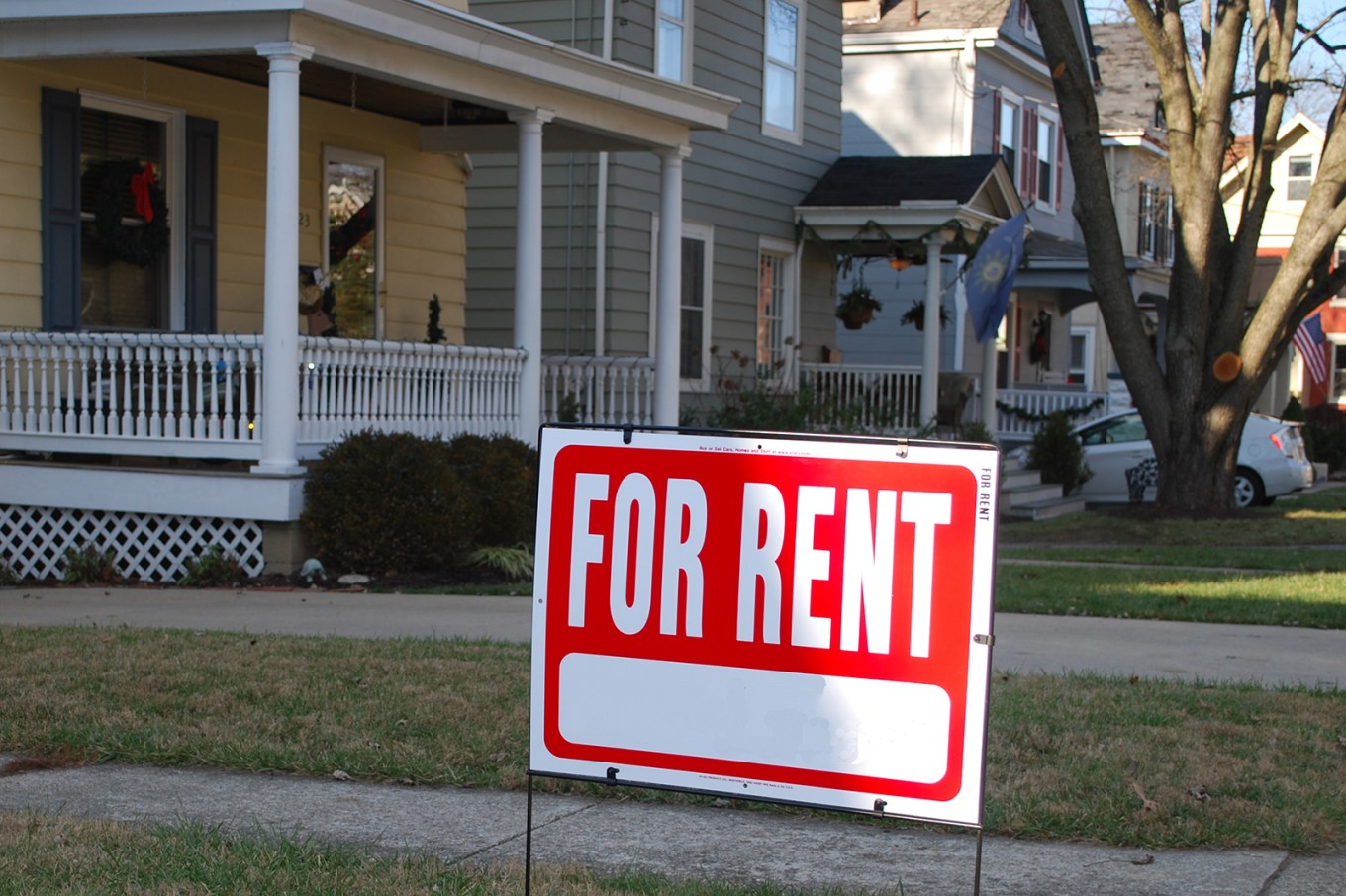 A for rent sign outside of a house