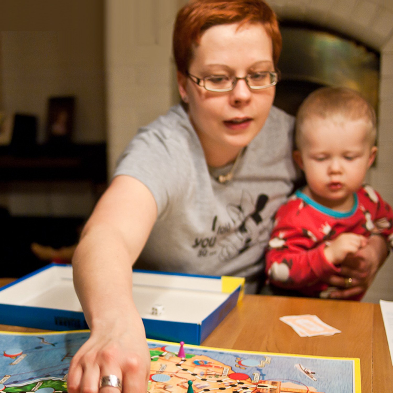 Woman playing a board game during the winter