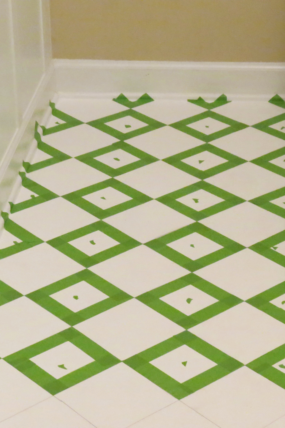 Painters tape creates checkerboard pattern on floors