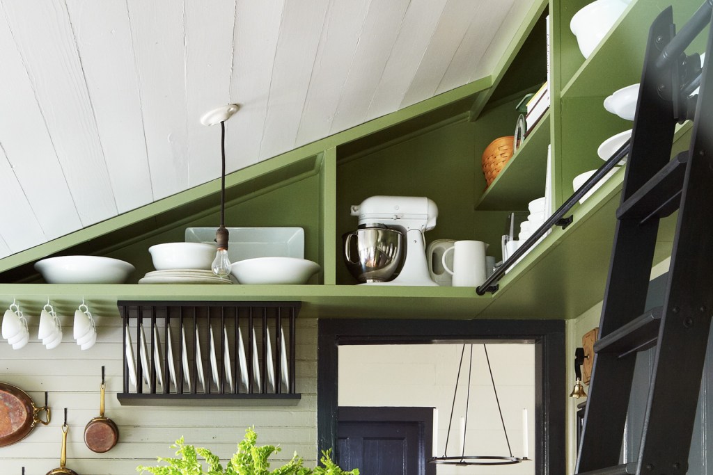 Kitchen with built-in rafter shelving