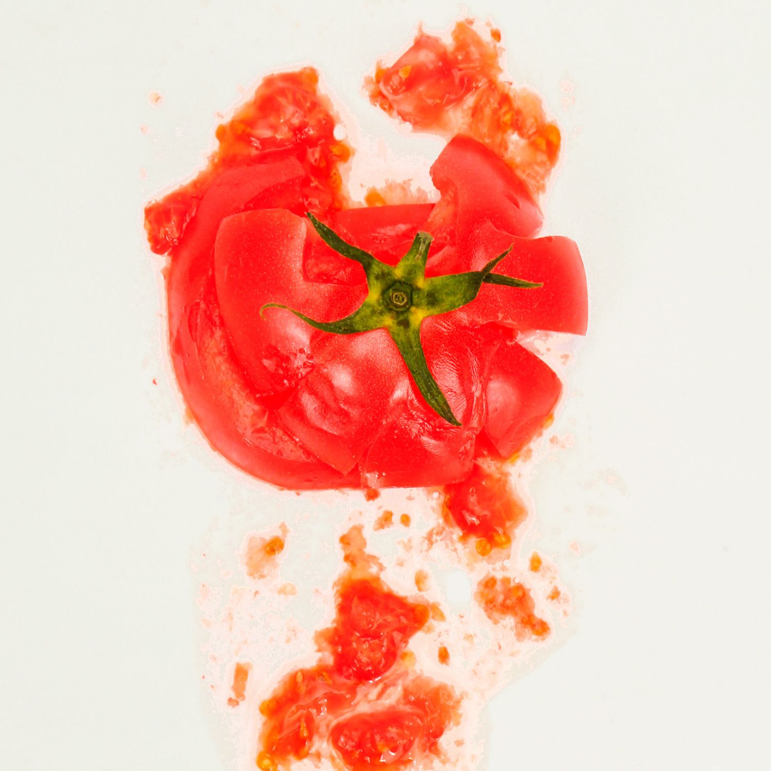 Tomato splatted against a kitchen wall