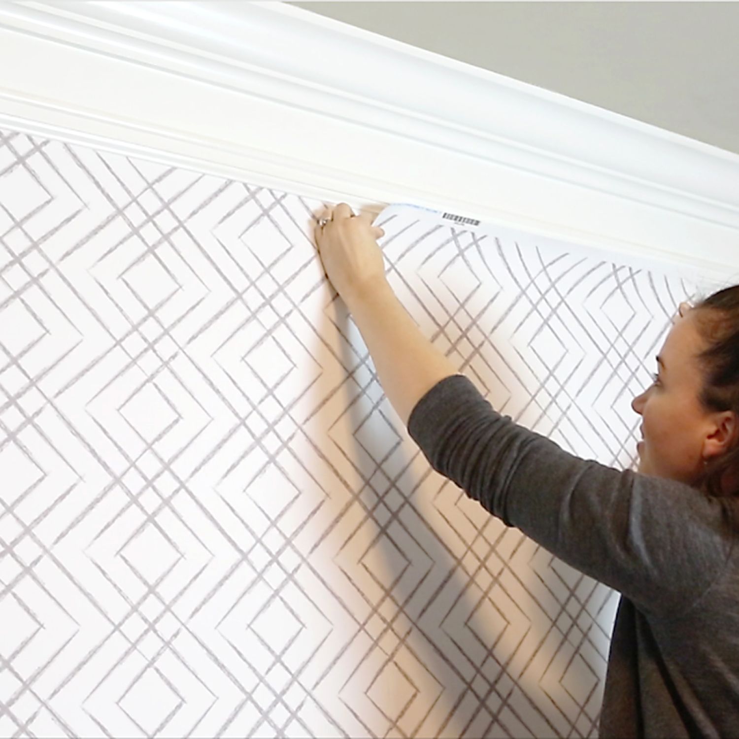 Katie Bower installs peel-and-stick wallpaper