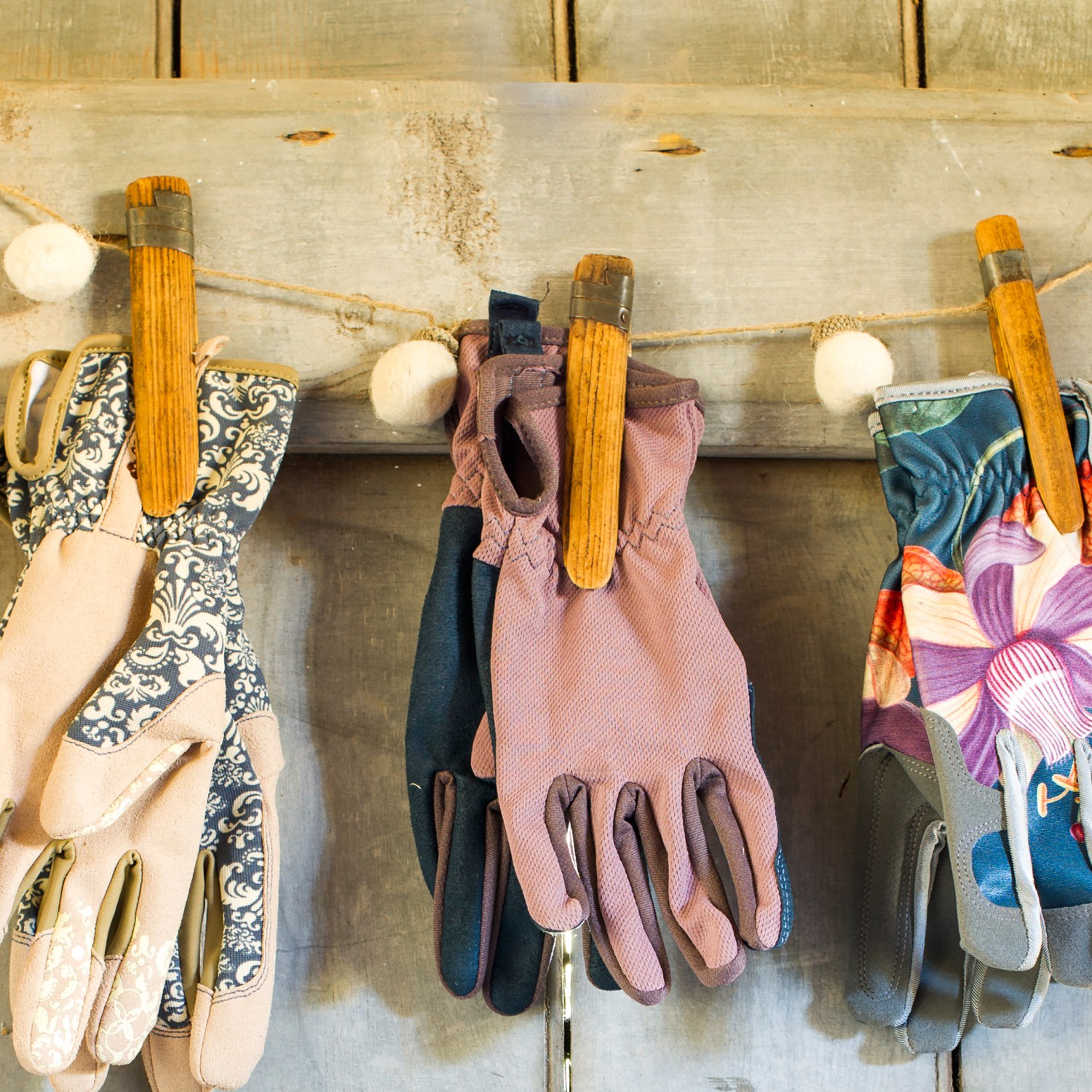 Garden gloves stored on line with clothespins