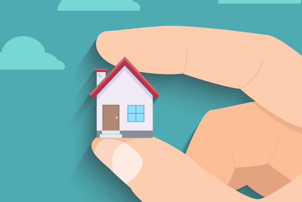 Illustration of holding a home in between two fingers