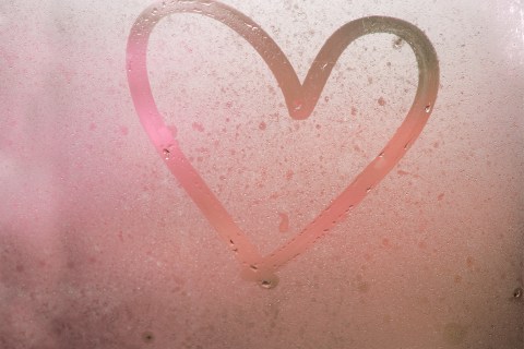 Heart drawn in a steamy mirror