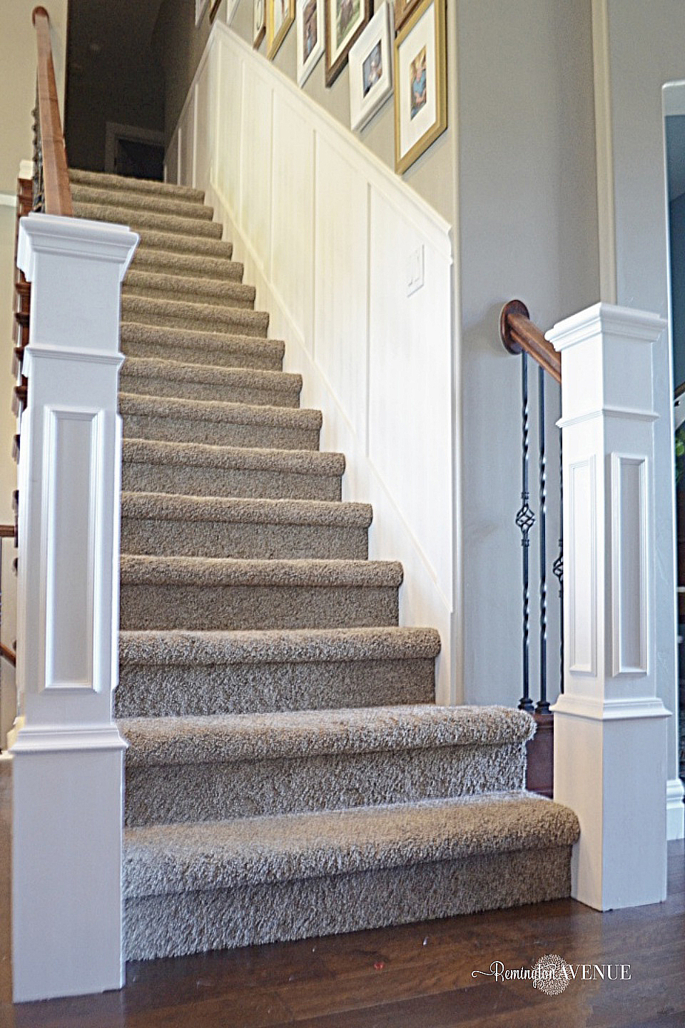 An after image of a staircase with white molding