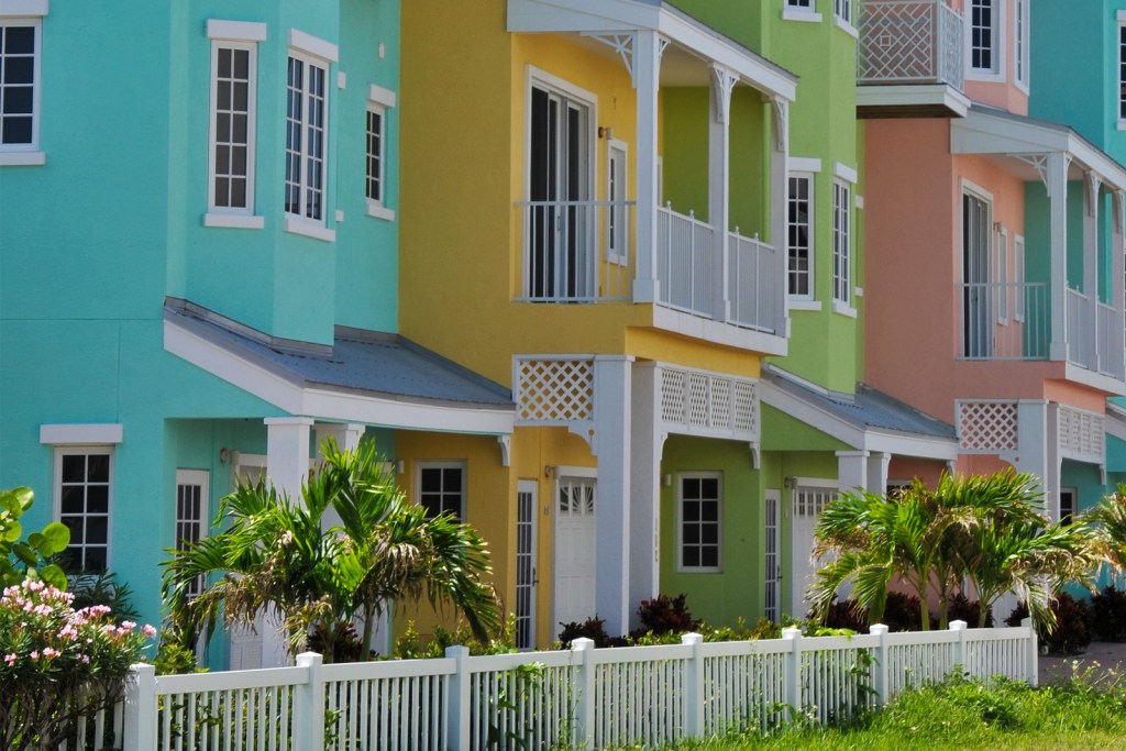 Colorfully painted condo exteriors in a warm climate