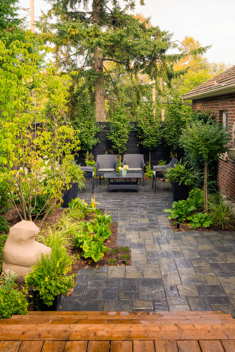 An after image from a deck with lush green grass