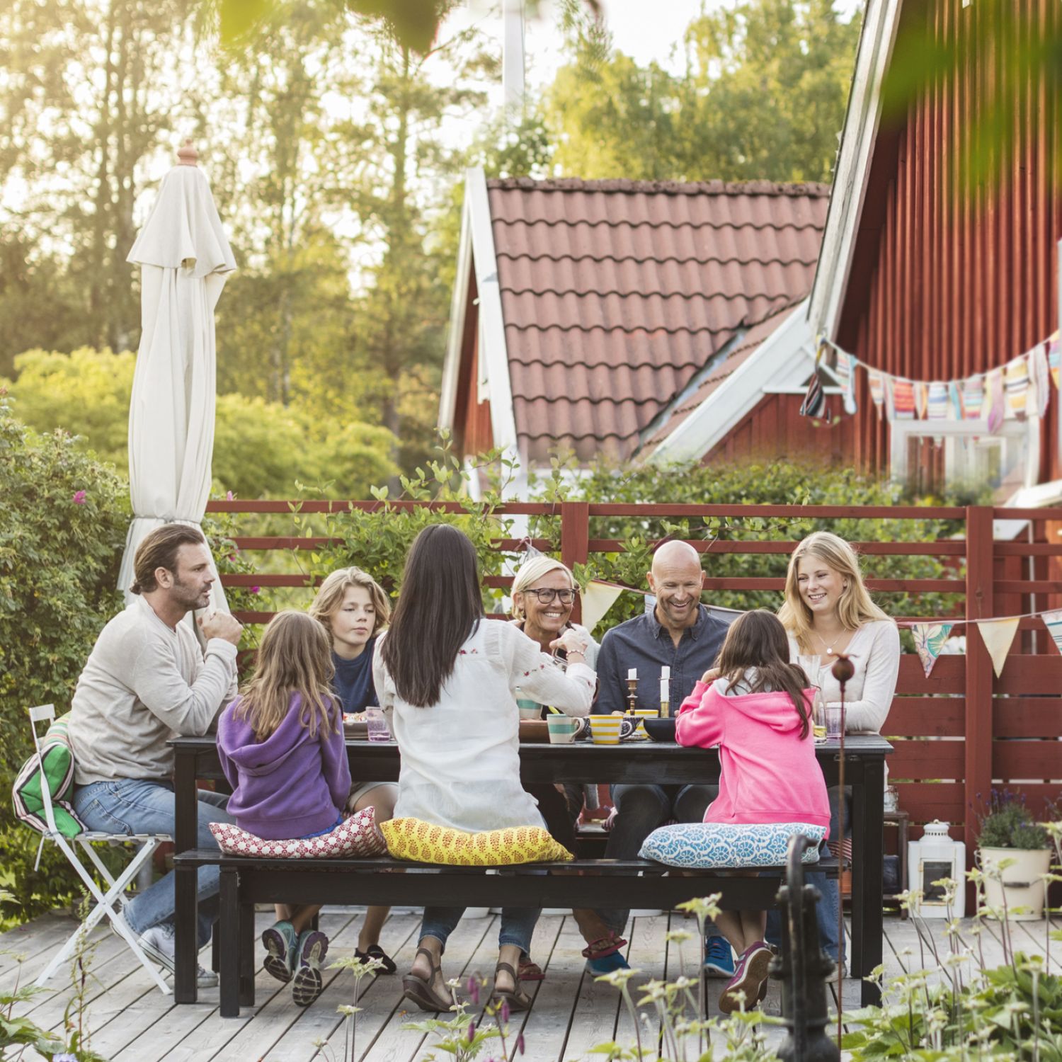 People enjoying a back yard patio