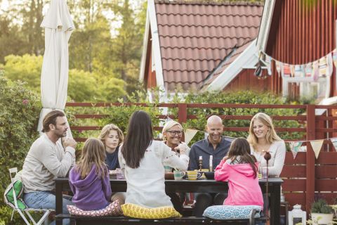 People enjoying a back yard patio