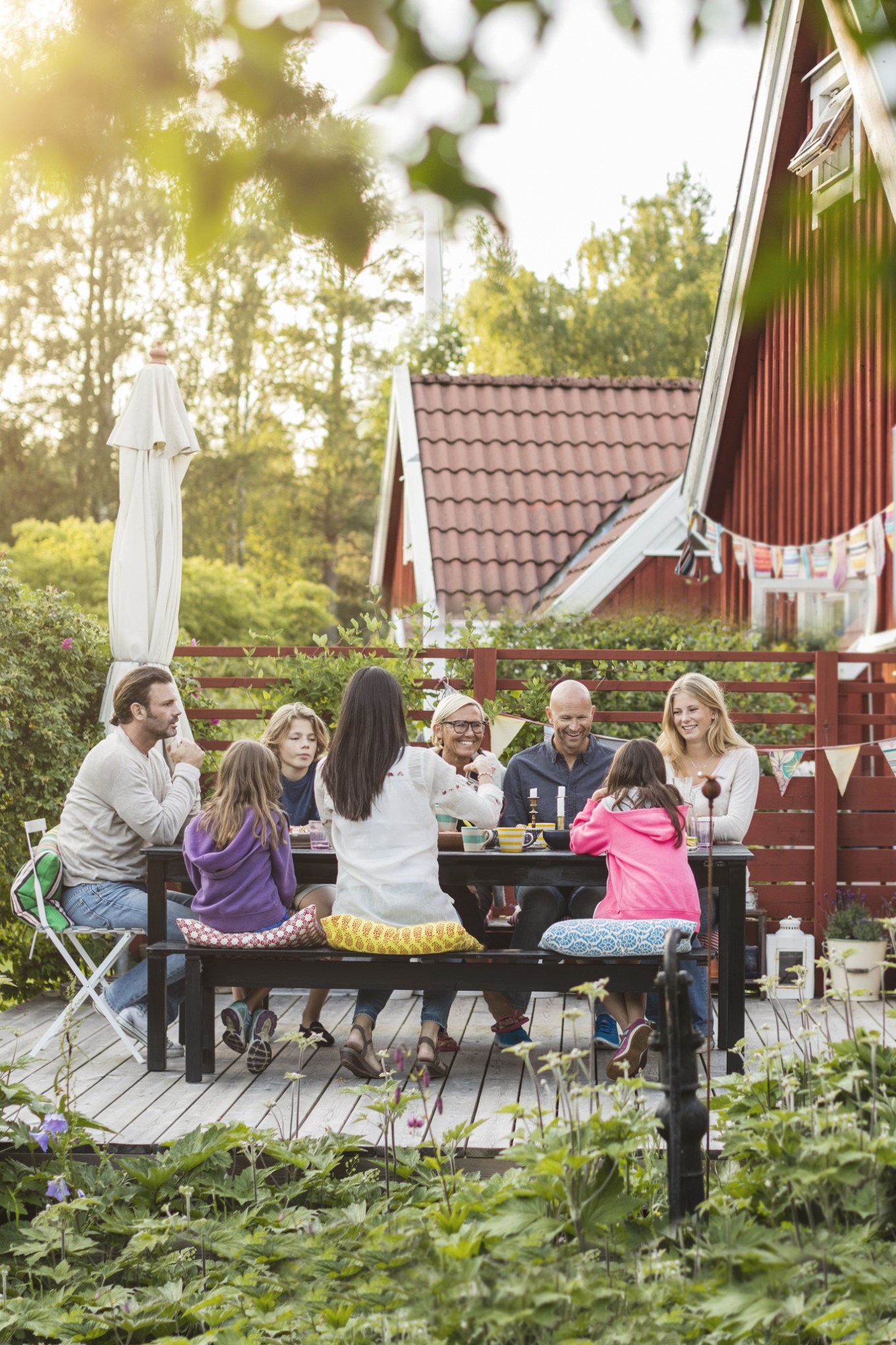 People enjoying a back yard patio