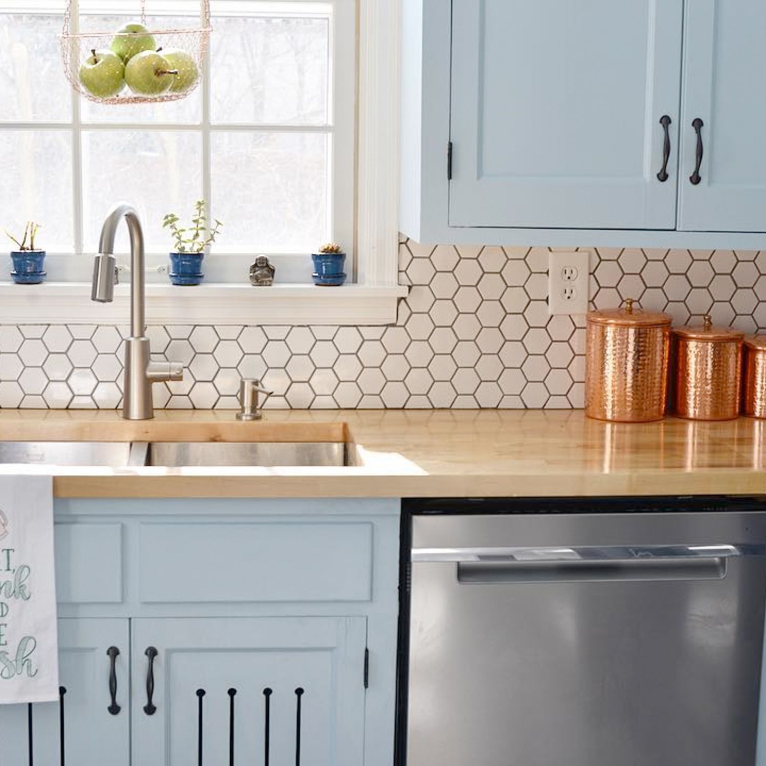 Newly renovated kitchen with hex tile backsplash