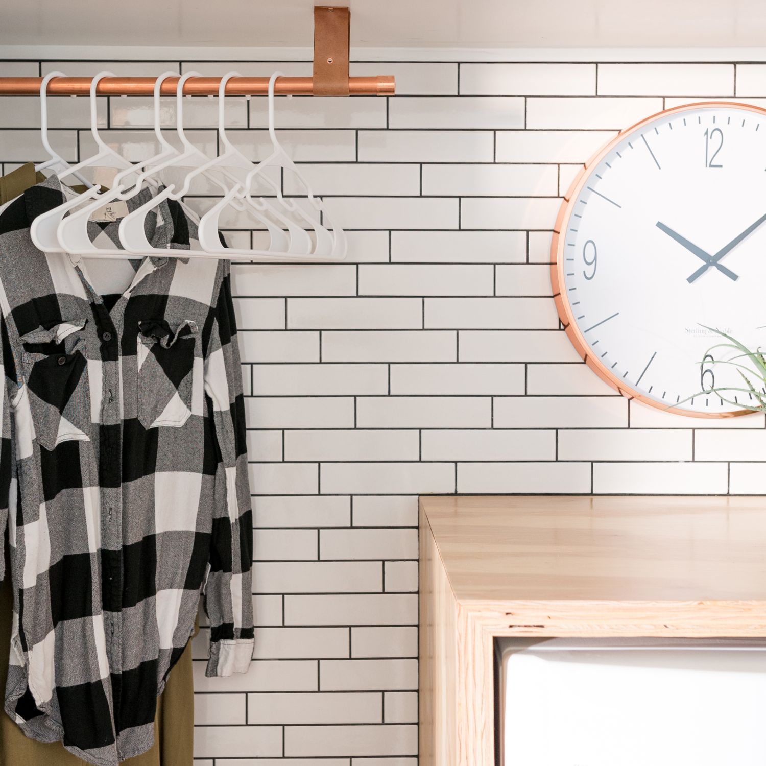 Subway tile backsplash in a home laundry room