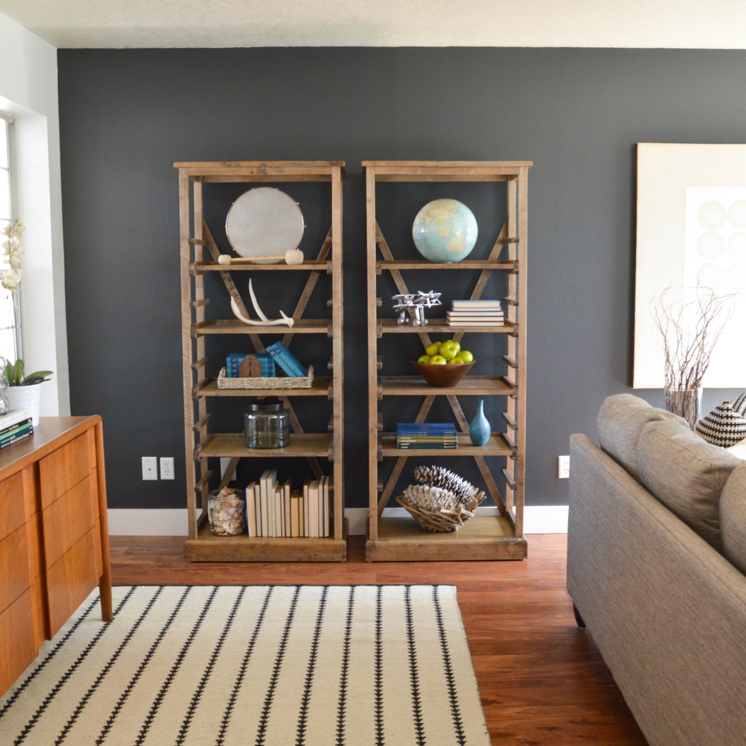 Charcoal paint on an accent wall in a home living room