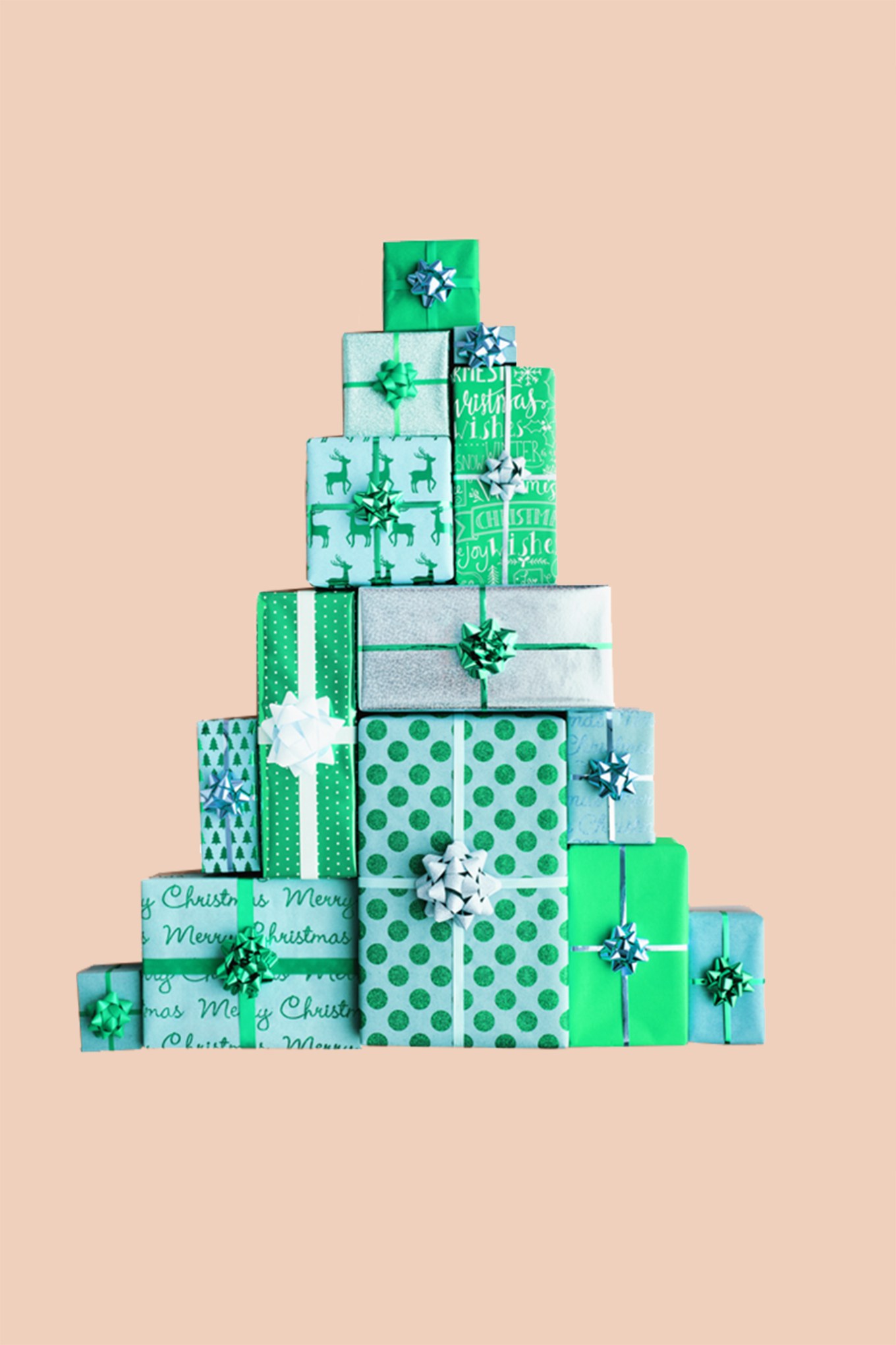 Gifts stacked in the shape of a Christmas tree | Organized